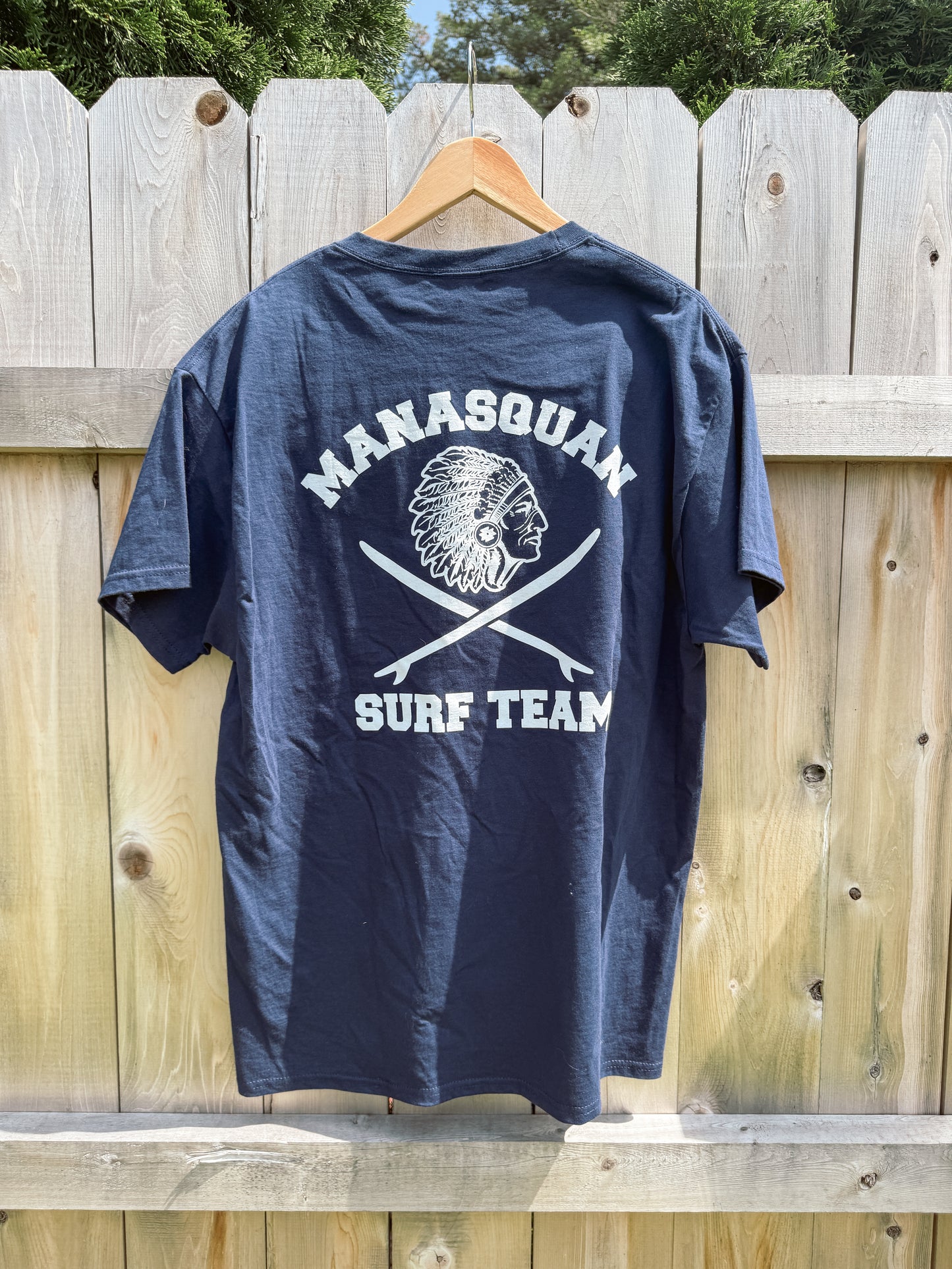 Manasquan High School Surf team classic unisex tee featuring a front logo hit and full back graphic. Soft, comfortable, and made for life on and off the beach. 100% Cotton